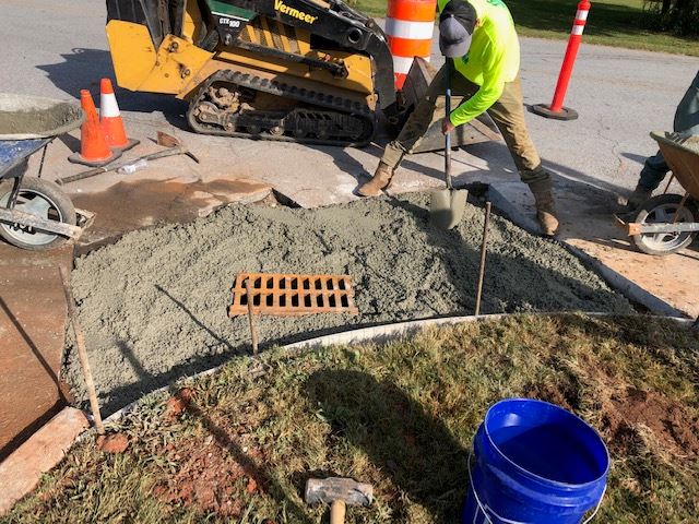 Someone working on a grate