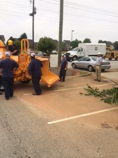 People working with a machine
