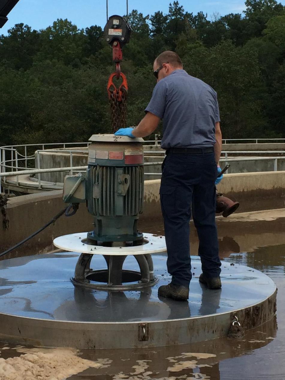 Man at a water pollution machine