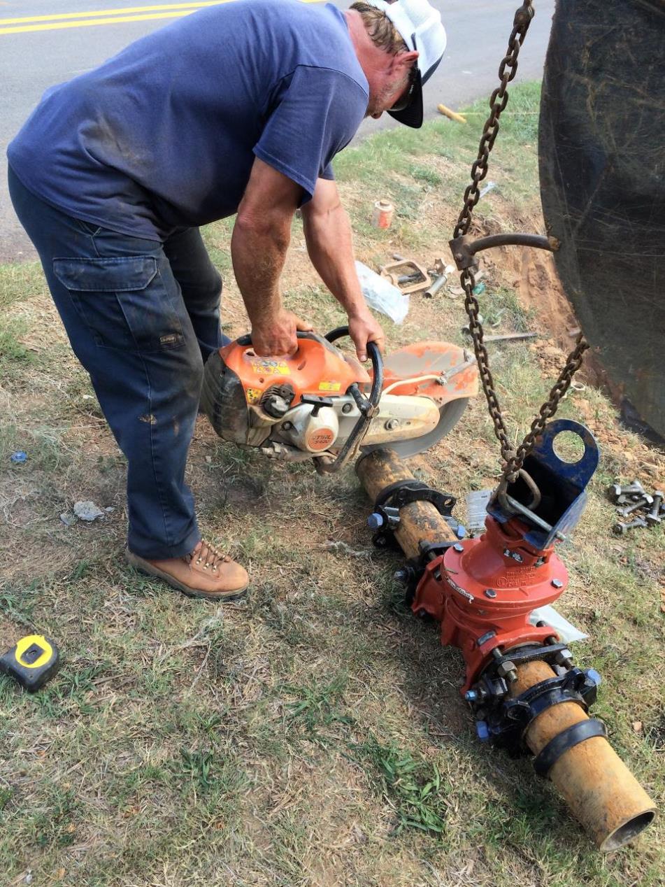 A water distribution worker